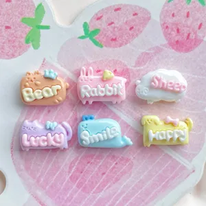 Mini animal resin flatbacks detail shot with cute English words for DIY hairpins and craft items.