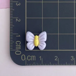 Mini purple butterfly resin cabochon detail, perfect for cute nail art and DIY case.