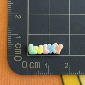 Mini resin lucky letter charms pastel alphabet cabochons for phone case DIY craft supplies.