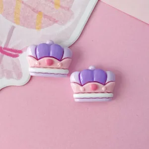 Cute resin crown DIY charms detail shot, perfect for handmade hair clips and crafts decoration.