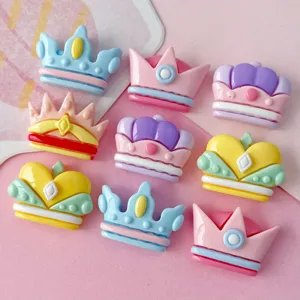 Glossy crown resin charms, close-up view of colorful DIY accessories for handmade crafts and shoes.