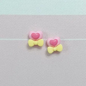Mini heart bow solid resin accessories for DIY nail art, hair clips and phone case decoration.