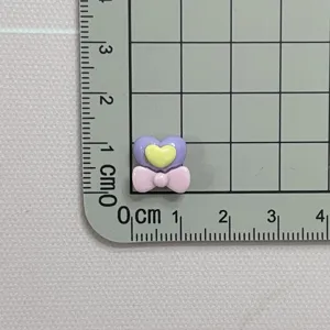 Mini heart bow resin cabochons for DIY nail art, hair clips, cream glue crafts and deco.