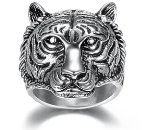 Detailed macro view of a vintage stainless steel tiger head ring for men's fashion jewelry