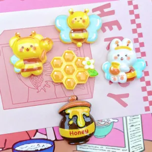 Cute resin bee honey pot cabochons for DIY phone case scrapbooking craft accessories.