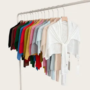 Detail view of lightweight summer knitted bolero shawl, solid color multi-wear cape for women.