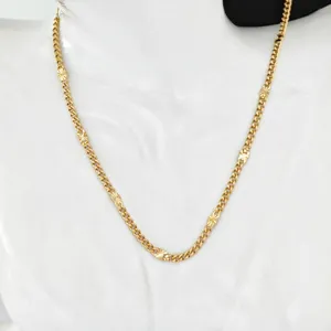 Detailed view of the stainless steel gold necklace featuring unique textured star links design.