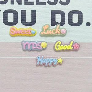 Resin letter charms detail view, jelly color DIY accessories for phone cases and shoes.