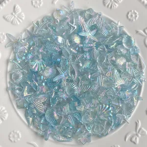 Charms en résine ocean irisée transparente étoile de mer coquillage queue de sirène.