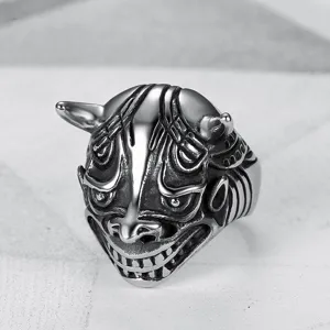 Detailed view of vintage titanium steel monster ring with intricate horned mask design