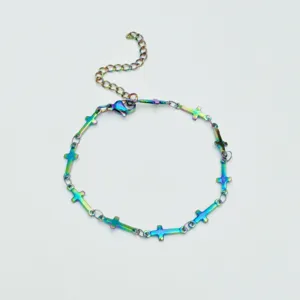 Stainless steel rainbow cross bracelet with extension chain, stylish jewelry accessory.