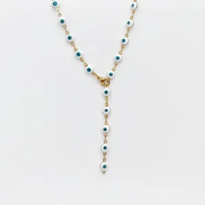 Close-up detail view of stainless steel gold evil eye Y necklace pendant charm link accessory.