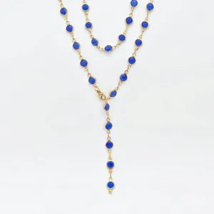 Gold stainless steel Y-shaped layered necklace with blue round glass stone details for women.