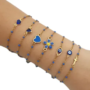Gold stainless steel stackable bracelets with blue enamel evil eye heart flower charms for women