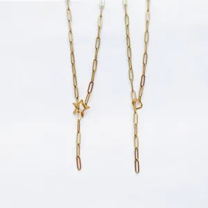 Details of the gold stainless steel paperclip chain necklace with star and heart charms.