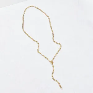 Detailed close-up view of the elegant gold paperclip chain Y-necklace showcasing delicate links.