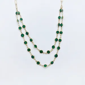 Stainless steel double layer necklace with green bezel set crystals for women daily wear.