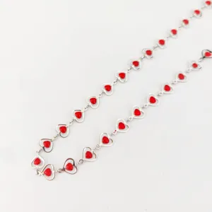 Stainless steel red heart chain detail view, fashionable cute minimalist jewelry item.