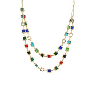 Gold-tone double layer stainless steel necklace featuring colorful square crystal pendants.
