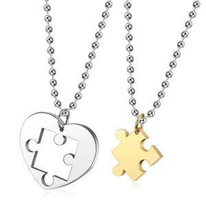Stainless steel heart puzzle couple necklace detail showing polished finish