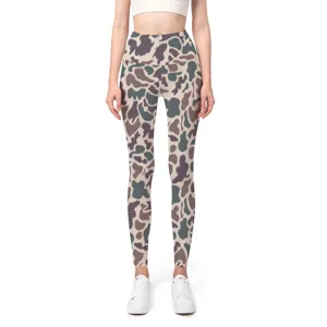 Front view of women's camouflage seamless high-waist yoga leggings on model