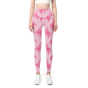 Close-up of pink high-waisted seamless yoga leggings with pink cowboy horse print