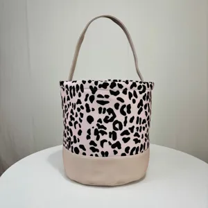 Close-up detail of the pink leopard print canvas bucket bag for Halloween party treats