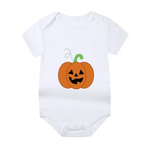 Detailed view of a white newborn baby bodysuit featuring a cute Halloween pumpkin print.