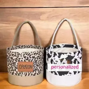Personalized Halloween canvas candy bucket bag featuring leopard and cow print designs