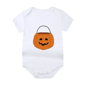 Detailed close-up of the Halloween pumpkin basket print on a soft white baby bodysuit.