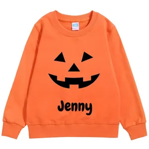 Personalised orange children sweatshirt with jack-o-lantern face print and custom name