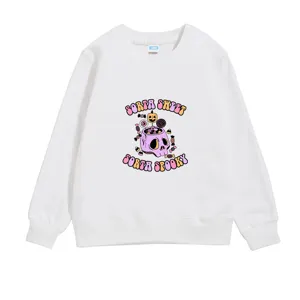 Close-up of kids white crewneck sweatshirt with 'Sorta Sweet Sorta Spooky' skull print.