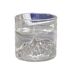 Artistic Mount Fuji whiskey glass featuring a unique 3D mountain base design for home decor