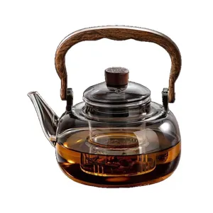 Tetera de vidrio de borosilicato resistente al calor con mango de madera e infusor