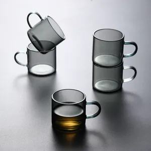 Set of five elegant smoke gray heat-resistant glass tea cups with smooth handles