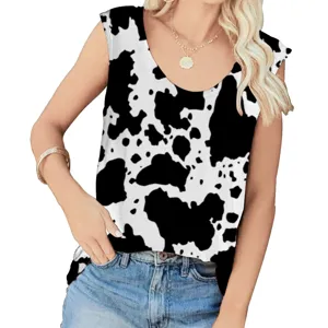 Detail shot of a women's U-neck sleeveless tank top with a bold cow print pattern