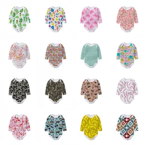 Variety of patterned long-sleeve baby bodysuits featuring cactus, smileys, and camo prints