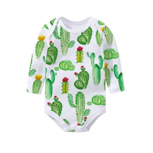Watercolor cactus print detail on long-sleeved baby bodysuit with soft white fabric
