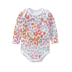 Detailed view of baby long-sleeve bodysuit with colorful leopard print fabric