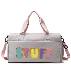 Grey large capacity travel duffel bag with colorful chenille STUFF letter patches