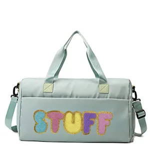 Large capacity mint green duffle bag with colorful fuzzy STUFF patch letters for gym and travel