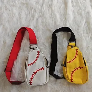 Two canvas sling bags in white and yellow featuring red baseball stitch embroidery