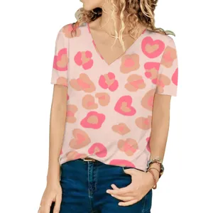 Detail shot of a women's V-neck short sleeve T-shirt featuring a pink heart leopard print