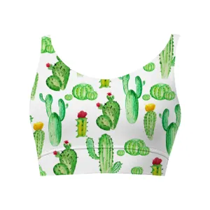 Close-up of women's sports bra featuring a vibrant watercolor cactus print on white fabric.