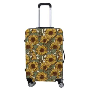 Detailweergave van een elastische kofferhoes met vintage zonnebloemprint op een koffer.