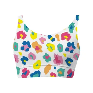Detail view of women's comfortable crop top bra with vibrant colorful leopard print