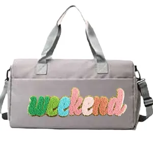 Grey Weekend sports gym bag with colorful embroidered lettering and adjustable strap