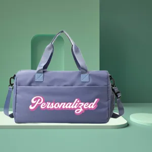 Macro view of purple travel duffel bag with personalized text in stylized green setting