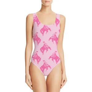 Front view of women's pink one-piece swimsuit featuring cowboy bronco print on model