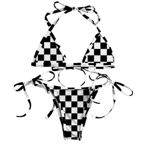 Detailed view of black and white checkerboard printed bikini set with tie-side design